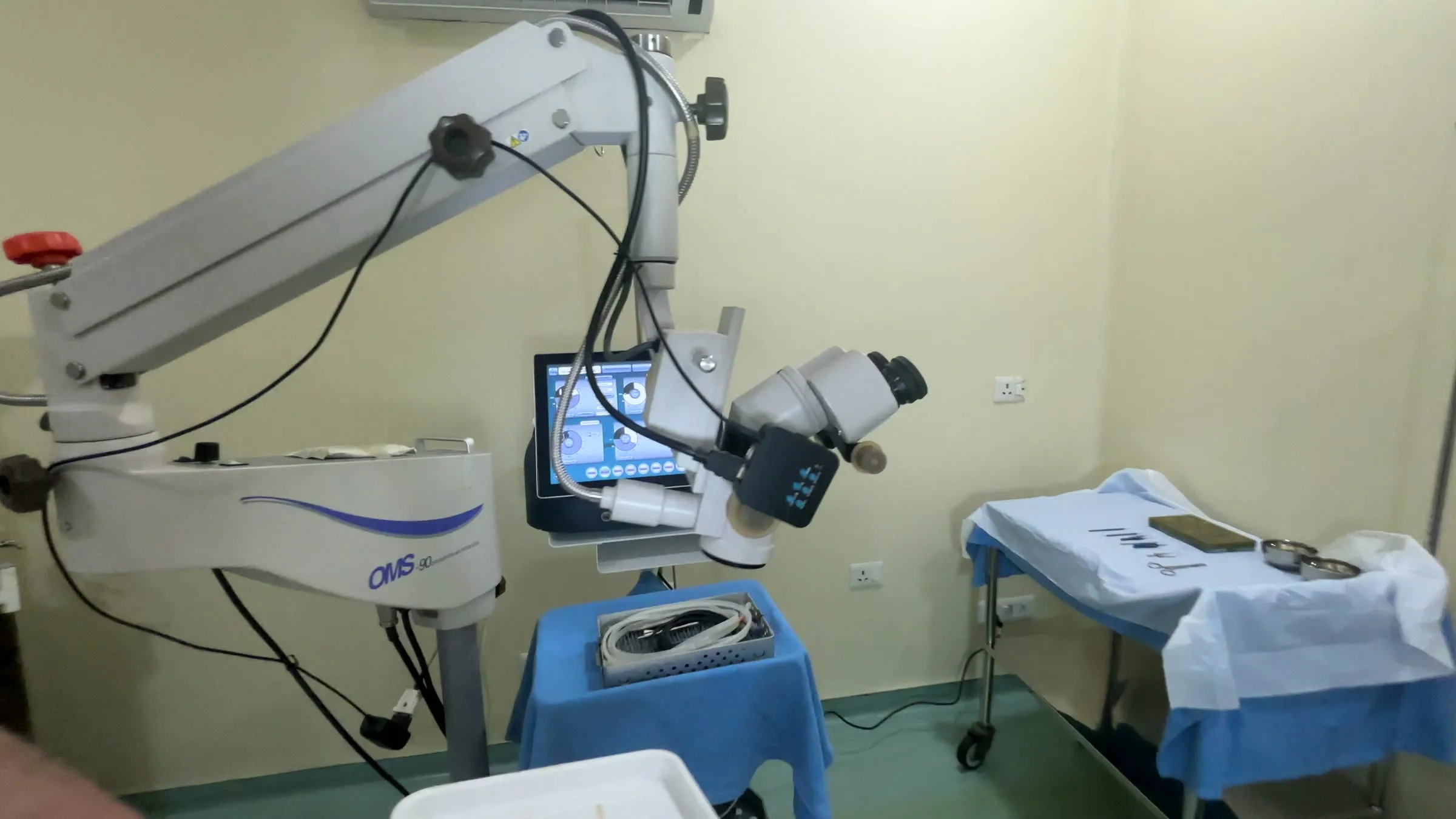 An operating microscope and equipment in an operation theatre at the centre