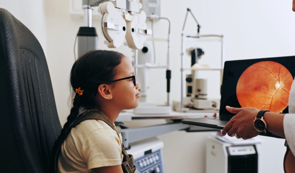 Doctor, laptop or girl in eye test at optometry at optometry clinic for eyewear diagnosis or sight .